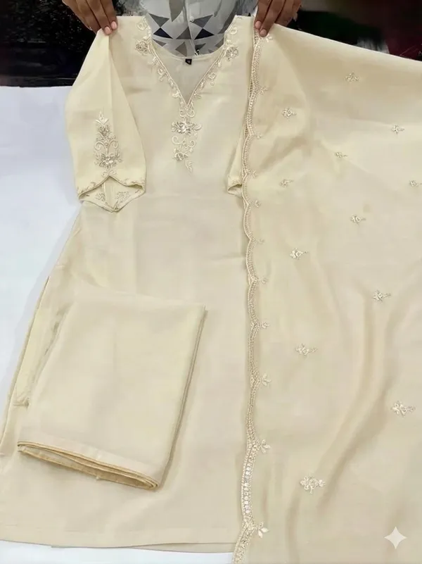 Elegant_Cream_Unstitched_Suit_Material_With_Golden_Embroidery_Work