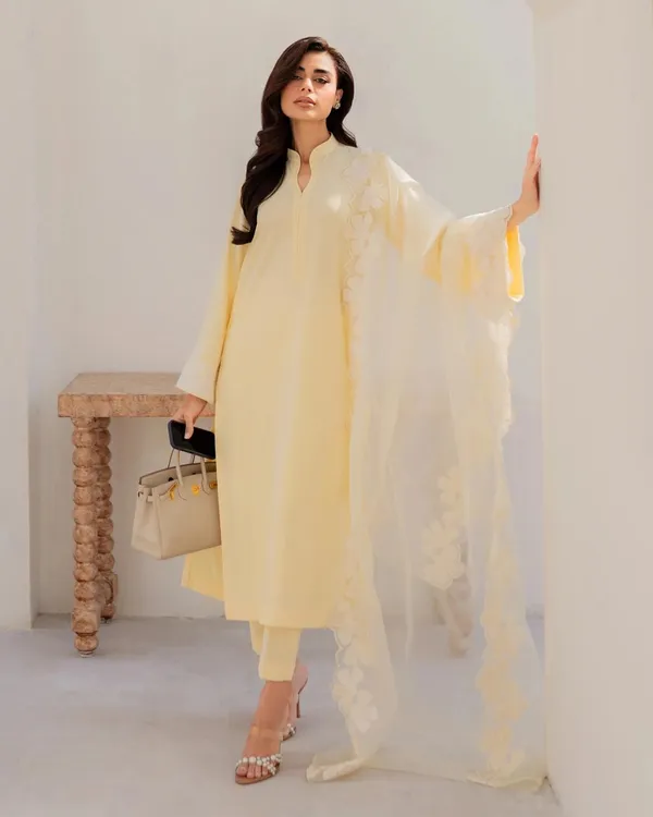 Elegant_Pastel_Yellow_Kurta_Set_With_Embroidered_Sleeves