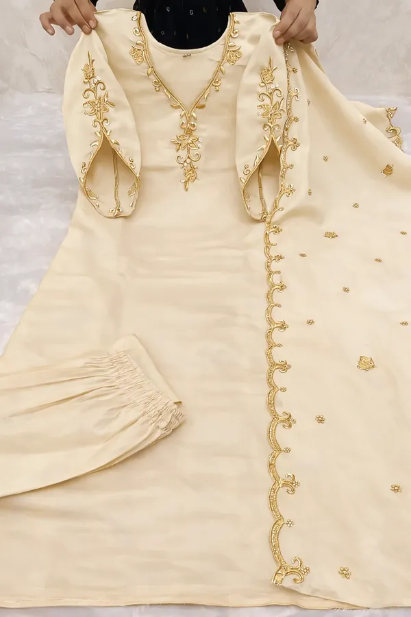 Elegant_Cream_Unstitched_Suit_Material_With_Golden_Embroidery_Work