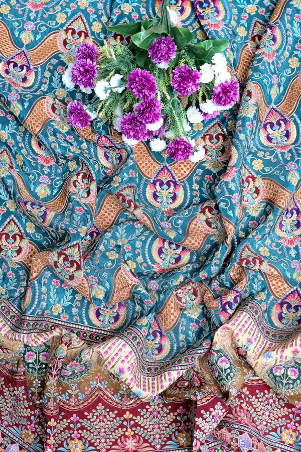 Natural_Crepe_Teal_Blue_Floral_Geometric_Placement_Print_Fabric_With_Ornamental_Panel_Border