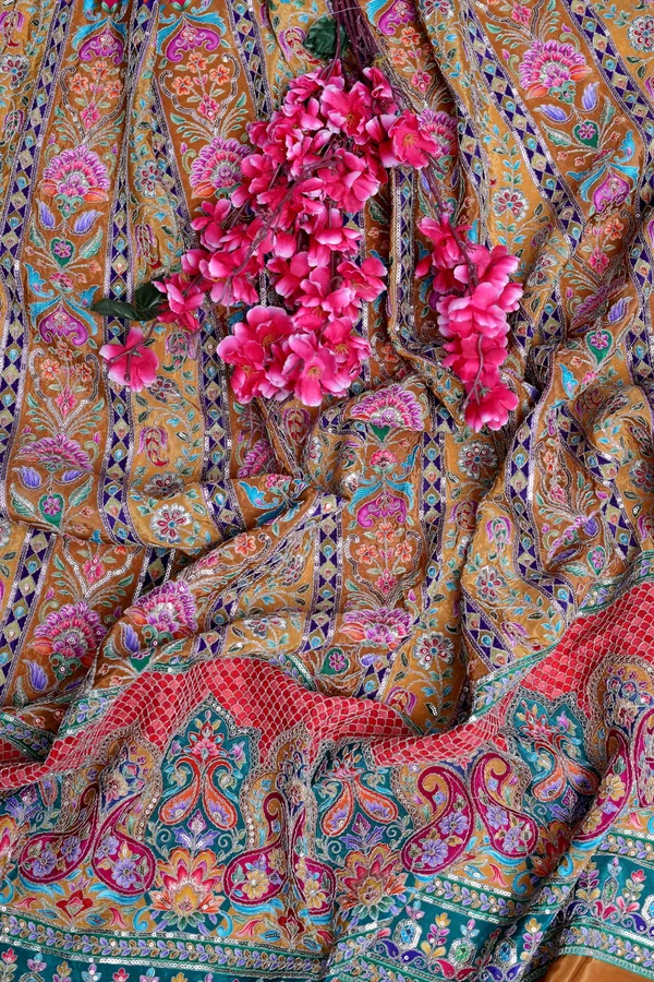 Natural_Crepe_Royal_Blue_Paisley_Floral_Placement_Print_Fabric_With_Peacock_Ornamental_Border