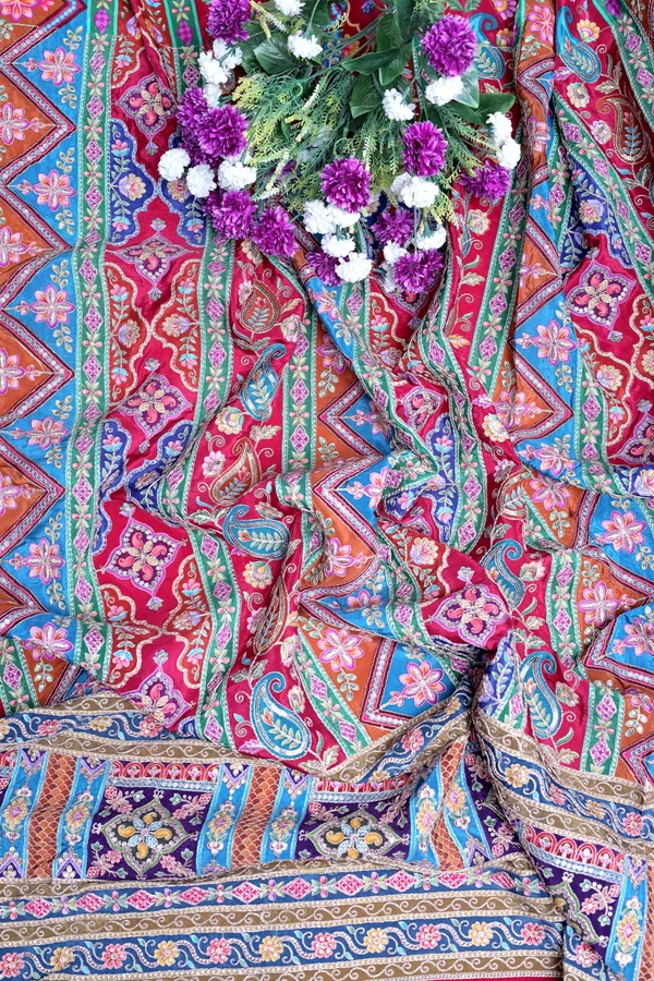 Natural_Crepe_Rani_Pink_Geometric_Ethnic_Placement_Print_Fabric_With_Paisley_Ornamental_Border
