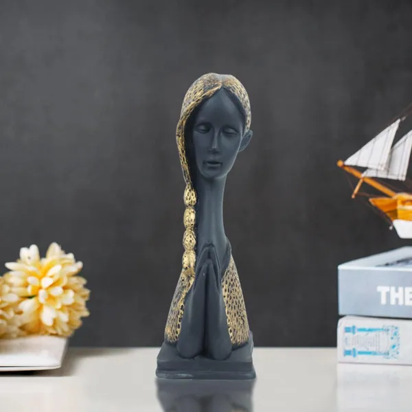 Decorative_Black_&_Gold_Lady_Figurine_With_Long_Braid