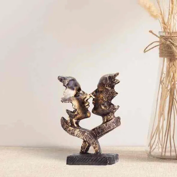 Decorative_DualFace_Sculpture_With_Ribbon_Design_On_Black_Base
