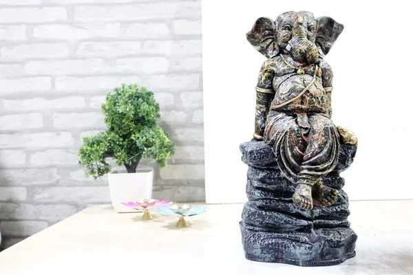 Handcrafted_Sitting_Ganesha_Idol_Statue_Antique_Finish_Stone_Sculpture