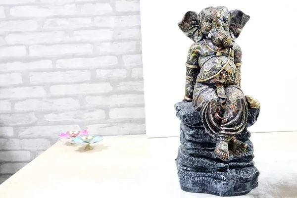 Handcrafted_Sitting_Ganesha_Idol_Statue_Antique_Finish_Stone_Sculpture