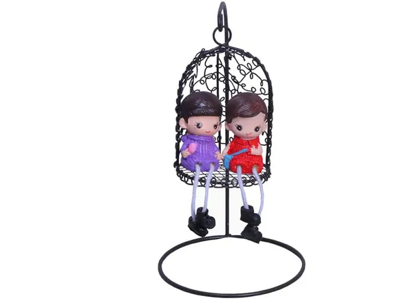 Decorative_Hanging_Birdcage_With_Couple_Dolls_Black_Metal_Cage_With_Purple_And_Red_Figurines