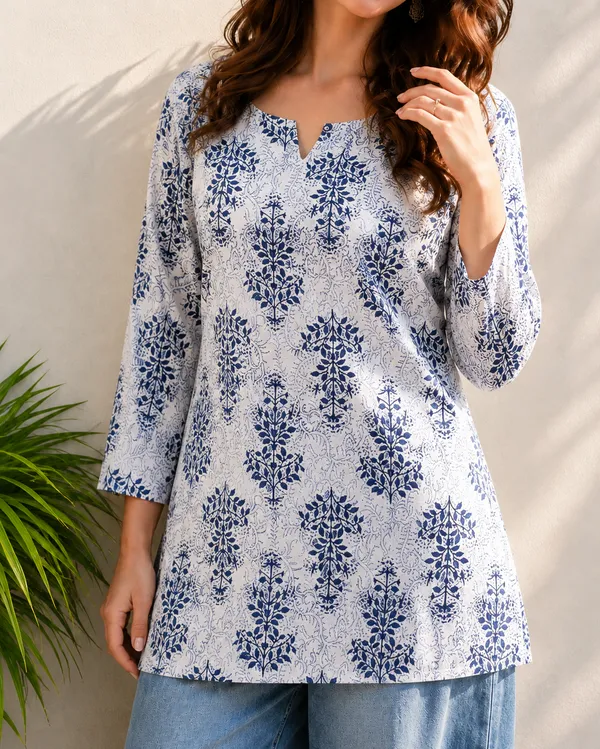 Vestimoni_White_&_Blue_Floral_Cotton_Blend_Short_Kurti_for_Women