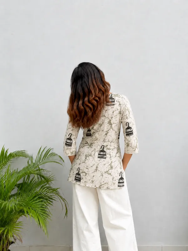 Vestimoni_Women's_Ivory_Abstract_Printed_Cotton_Short_Kurti