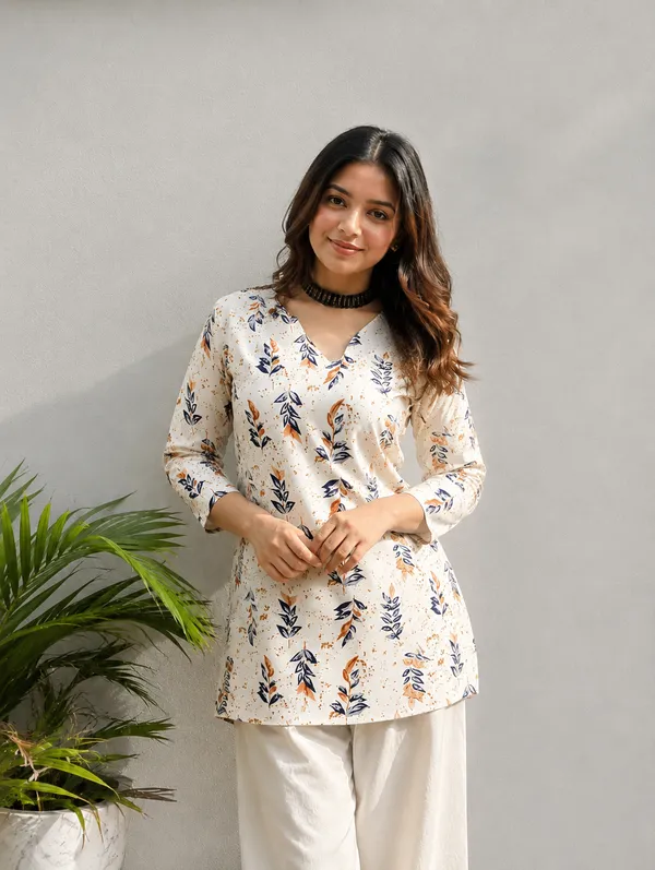 Vestimoni_Women's_Off_White_Leaf_Printed_Cotton_Short_Kurti
