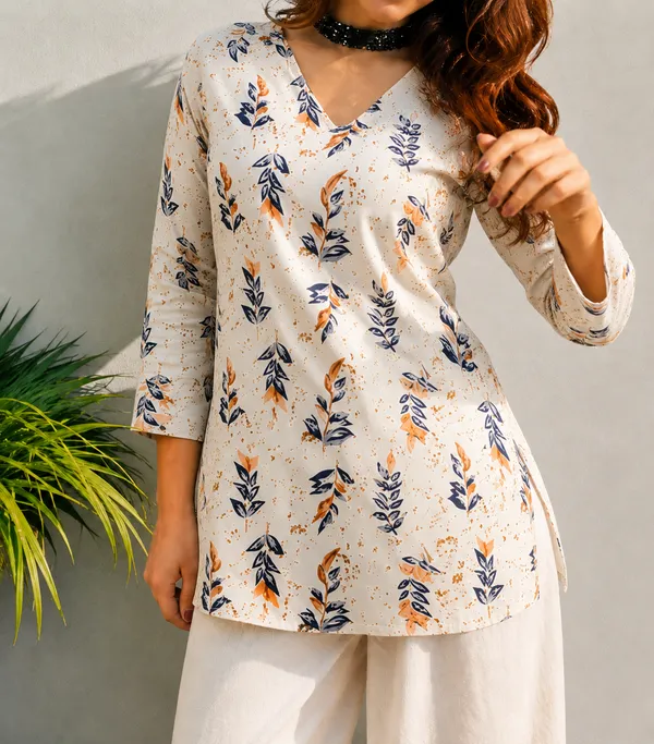 Vestimoni_Women's_Off_White_Leaf_Printed_Cotton_Short_Kurti