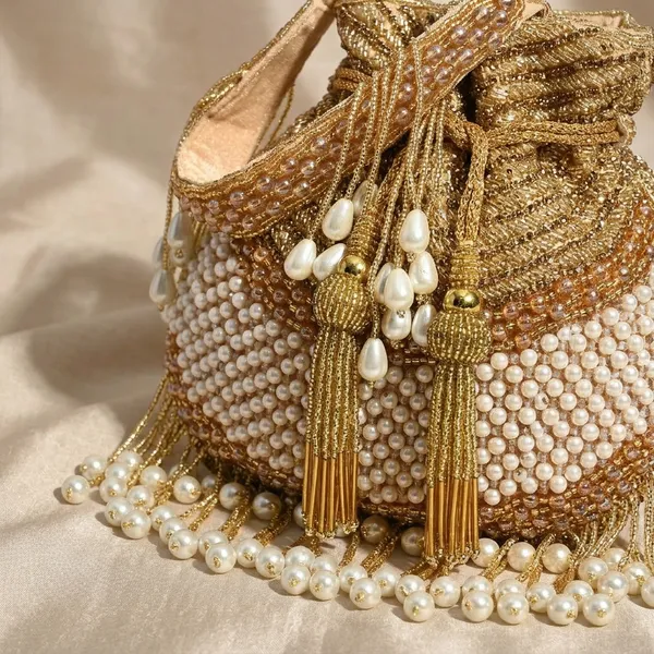 Golden_Silk_Base_And_Pearls_And_Micro_Beads_Work_Potli_Bag_For_Women