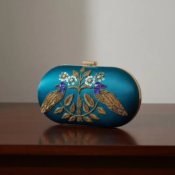 Blue_Silk_Base_And_Metal_Frame_And_Zardosi_Work_Embroidered_Bag_For_Women