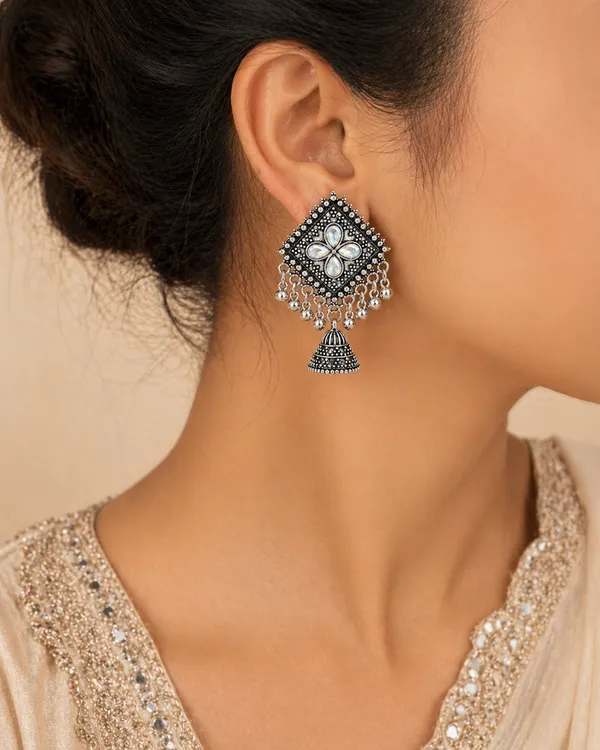 Oxidized_Silver_Tone_Jhumka_Earrings_With_Diamond_Shaped_Studs_And_Floral_Detailing