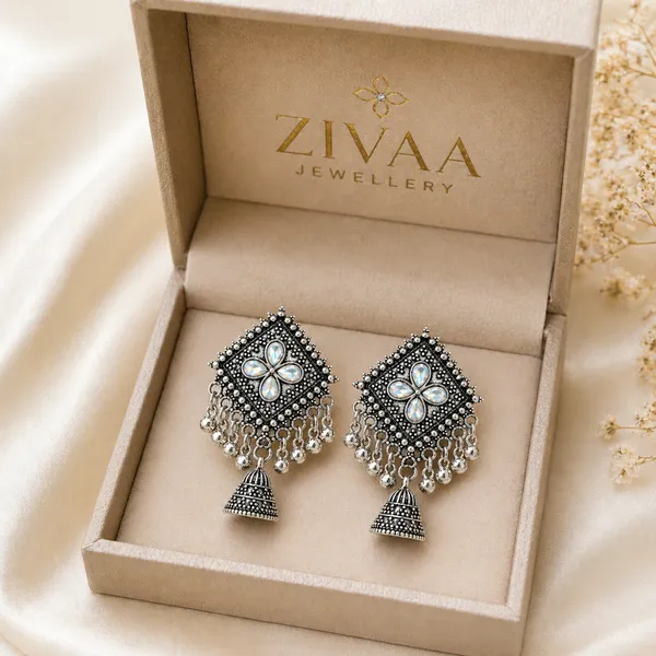 Oxidized_Silver_Tone_Jhumka_Earrings_With_Diamond_Shaped_Studs_And_Floral_Detailing