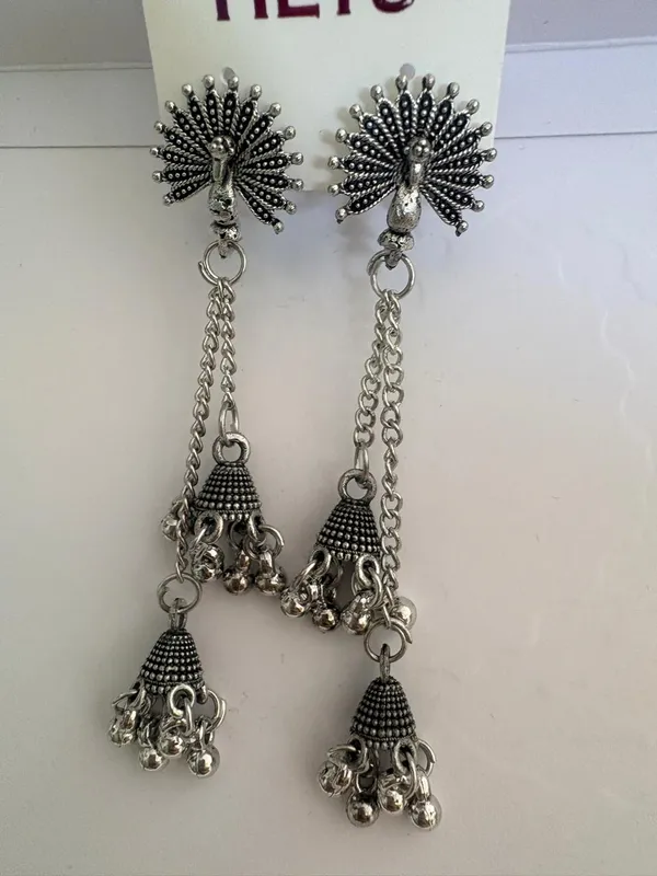 Oxidized_Silver_Toned_Brass_Peacock_Jhumka_Earrings_With_Dual_Chain_Drop_Bells