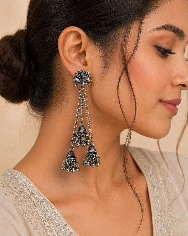 Oxidized_Silver_Toned_Brass_Peacock_Jhumka_Earrings_With_Dual_Chain_Drop_Bells