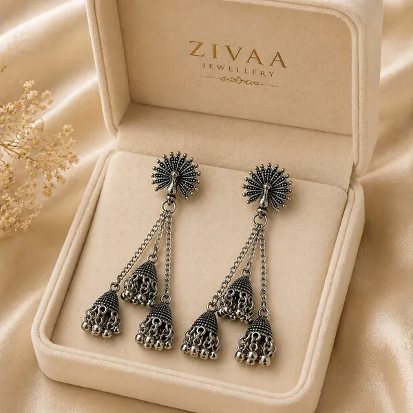 Oxidized_Silver_Toned_Brass_Peacock_Jhumka_Earrings_With_Dual_Chain_Drop_Bells