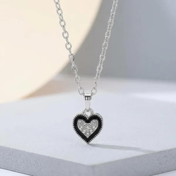 Silver_Toned_Brass_Heart_Pendant_Necklace_With_Crystal_Detailing