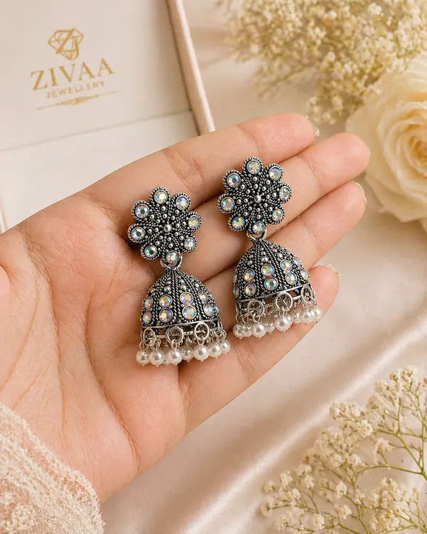 Oxidized_Silver_Toned_Brass_Jhumka_Earrings_With_Iridescent_Stones_And_Pearl_Dangles