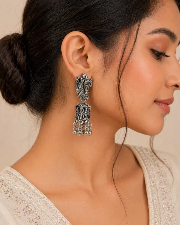 Oxidized_Silver_Toned_Brass_Radha_Krishna_Jhumka_Earrings_With_Peacock_Design