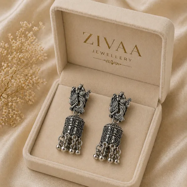 Oxidized_Silver_Toned_Brass_Radha_Krishna_Jhumka_Earrings_With_Peacock_Design