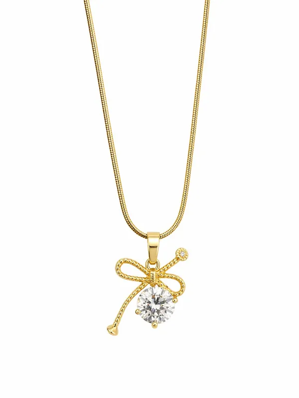 Gold_Toned_Brass_Ribbon_Bow_Pendant_Necklace_With_Clear_Crystal_Stone