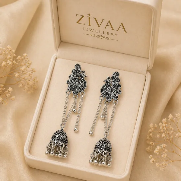 Oxidized_Silver_Toned_Brass_Peacock_Jhumka_Earrings_With_Chain