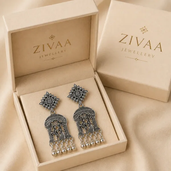 Oxidized_Silver_Toned_Brass_Jhumka_Earrings_With_Radha_Krishna_Design