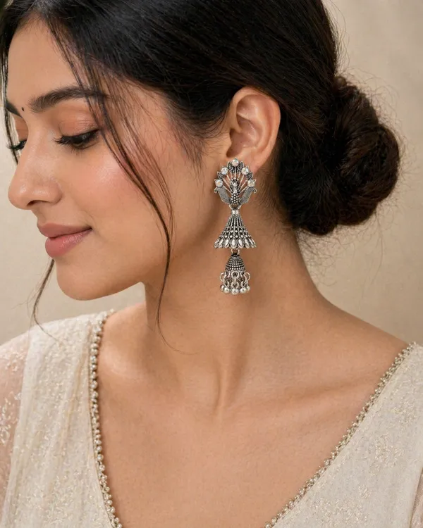 Oxidized_Silver_Toned_Brass_Peacock_Jhumka_Earrings_With_Iridescent_Stones
