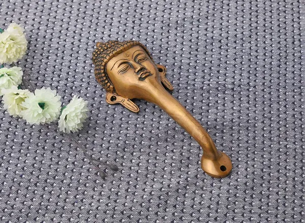 Gautam_Buddha_Face_Design_Brass_Door_Handle_Gautam_Buddha_Face_Brass_Door
