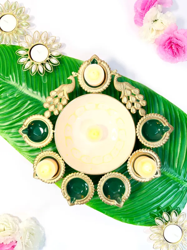 Peacock_Diya_7_Tealight_Holder_with_Urli_Center,_Glossy_Painted_Green,_Gold,,for_Diwali_and_home_décor