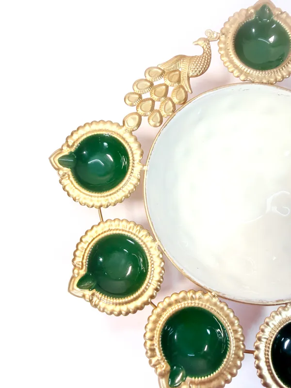 Peacock_Diya_7_Tealight_Holder_with_Urli_Center,_Glossy_Painted_Green,_Gold,,for_Diwali_and_home_décor