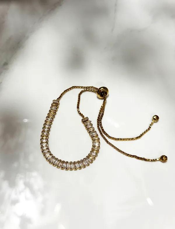 The_Paizley_Eternal_Baguette_Crystal_Tennis_Bolo_Bracelet_–_Premium_Gold_Finish