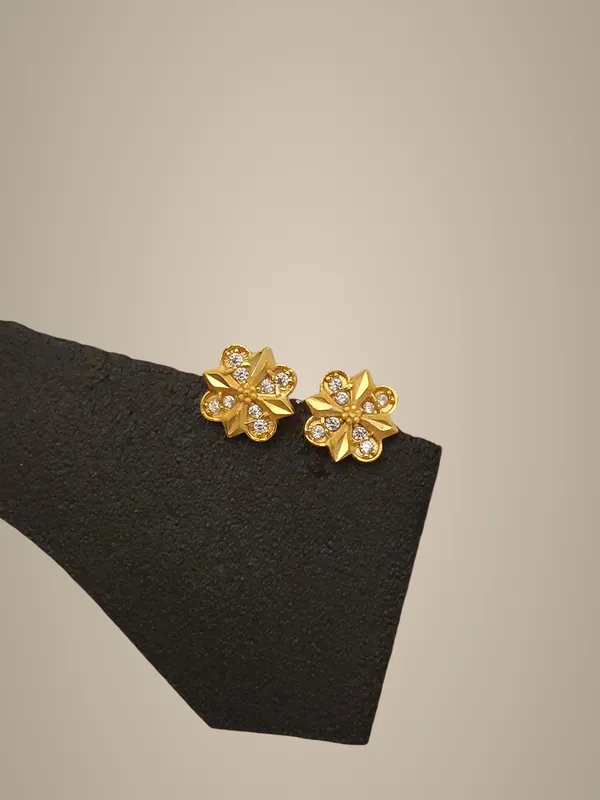 Golden_Floral_Stud_Earrings_with_Crystal_Embellishments