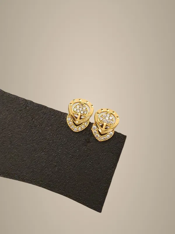 Golden_Floral_Twist_Stud_Earrings_with_Crystal_Accents
