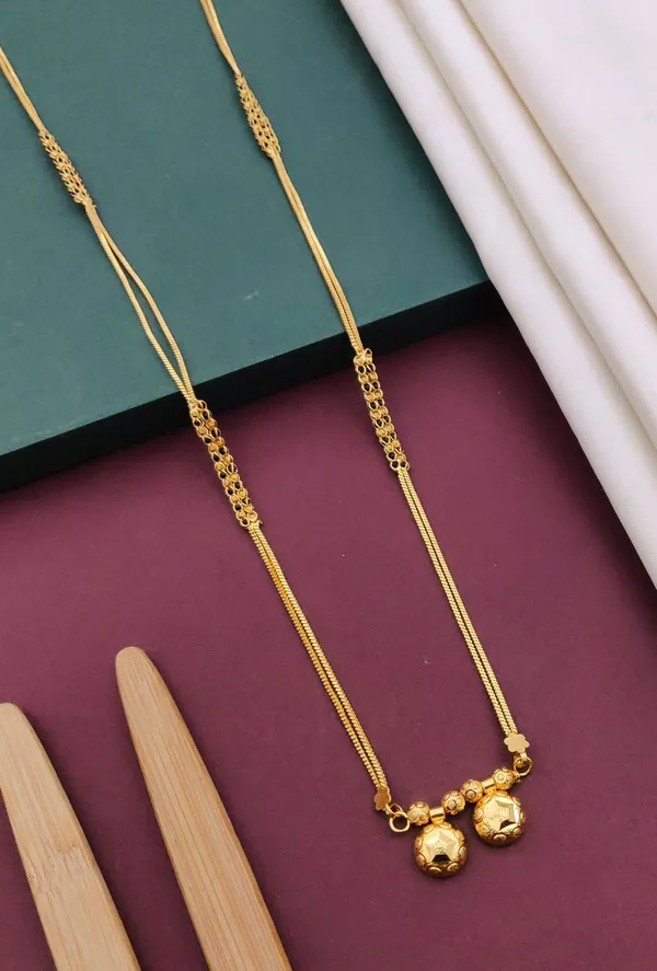 Elegant_Gold-Toned_Layered_Chain_Necklace_with_Dual_Sphere_Pendants