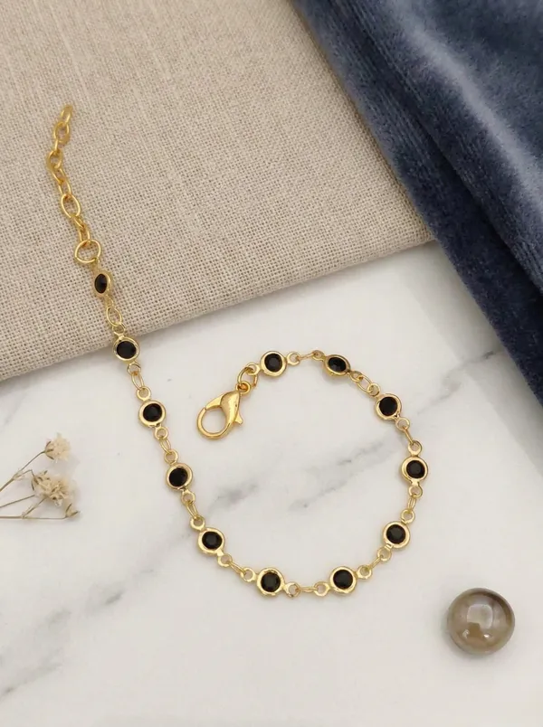 Gold-Plated_Bracelet_with_Black_Stone_Accents