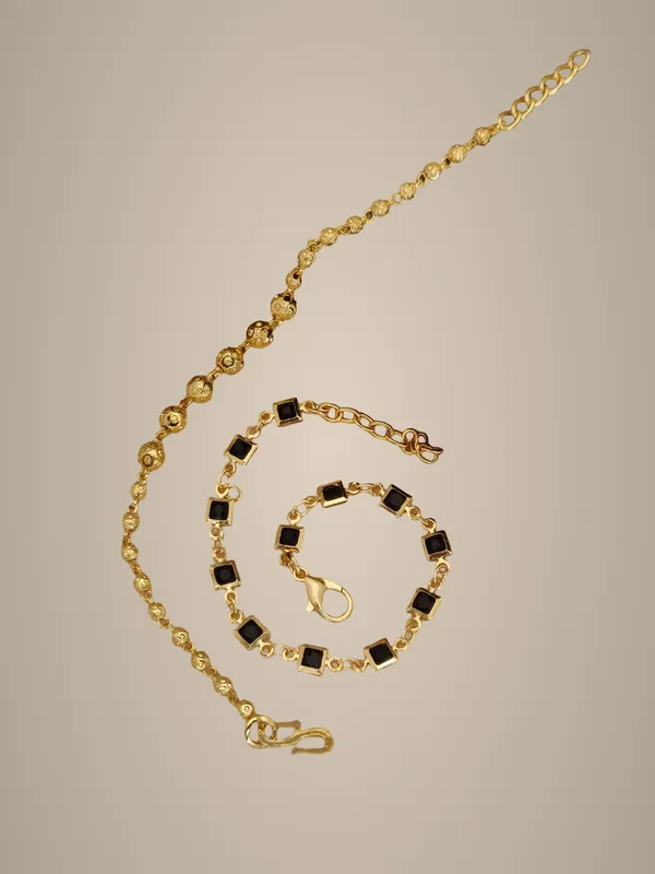 Elegant_Gold-Toned_Bracelet_Set_with_Black_Enamel_Accents