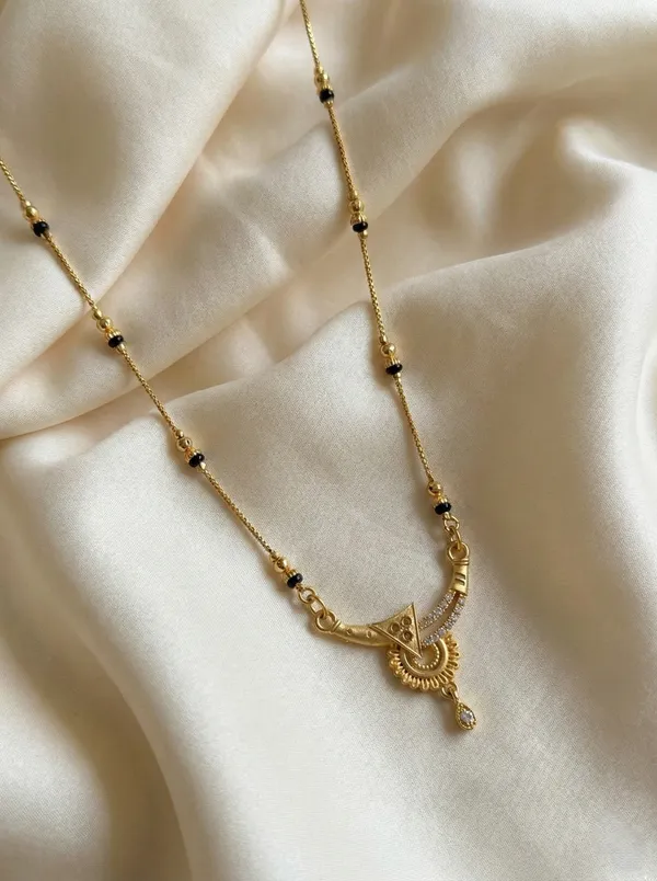 Beautiful_Gold_Plated_Half_Moon_Design_Mangalsutra_With_Cz_Stones_Black_Beads_Daily_Wear_Mangalsutra_For_Women