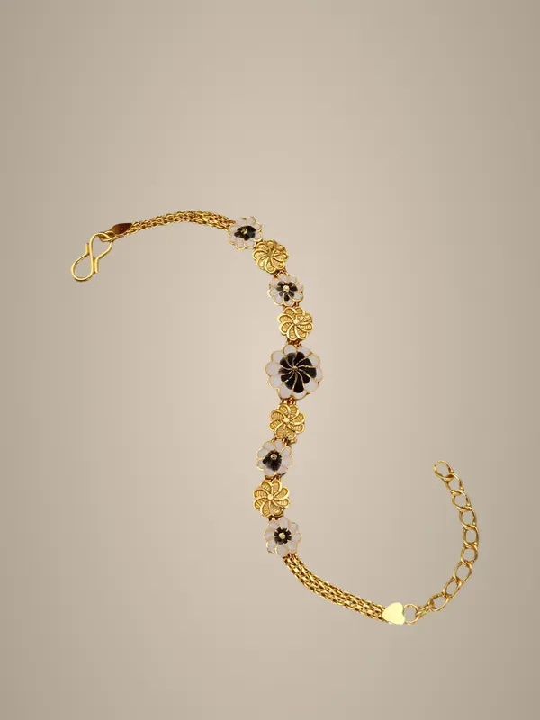 Golden_Floral_Enamel_Bracelet_with_Black_and_White_Flower_Charms