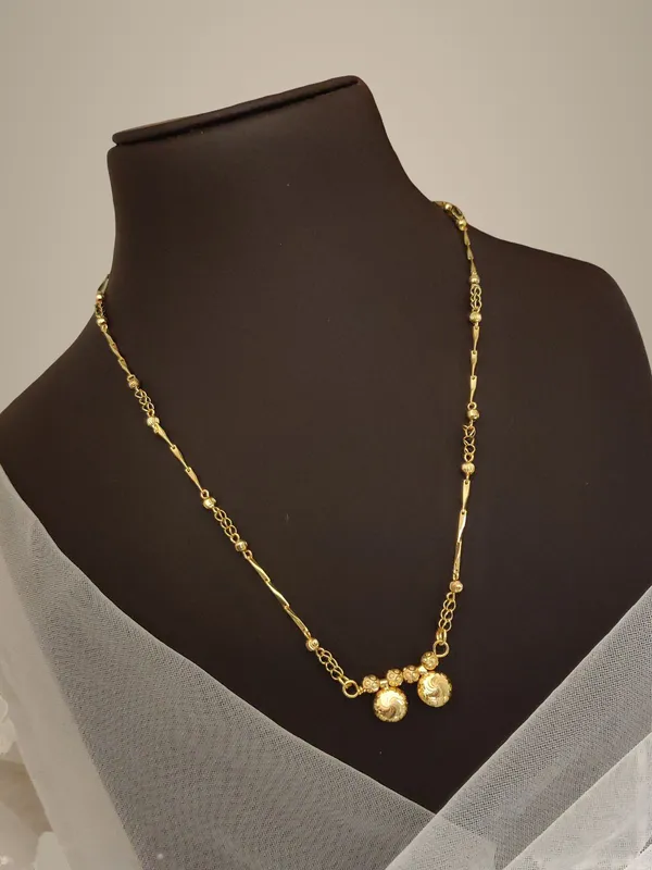 Gold-Toned_Chain_Necklace_with_Three_Ball_Pendant