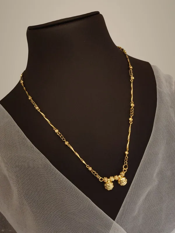 Elegant_Gold-Toned_Chain_Necklace_with_Triple_Ball_Pendant