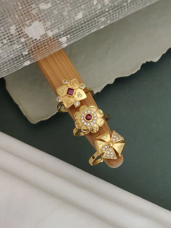 Traditional_Gold_Plated_Ring_Set_with_Gemstone_and_Diamond_Accents