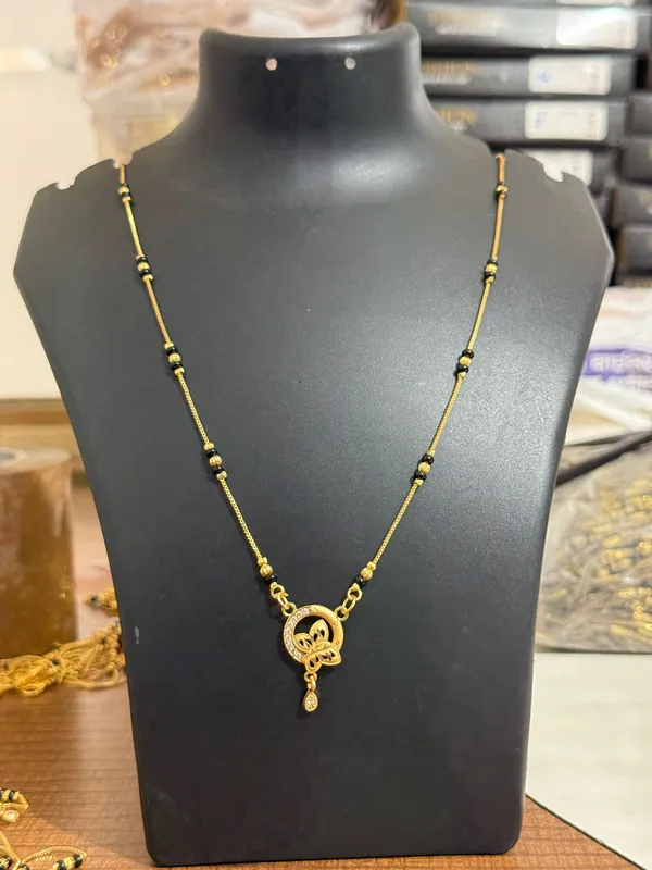 Beautiful_Gold_Plated_Mangalsutra_With_Black_Beads_Butterflyy_Inspired_Designer_Pendant