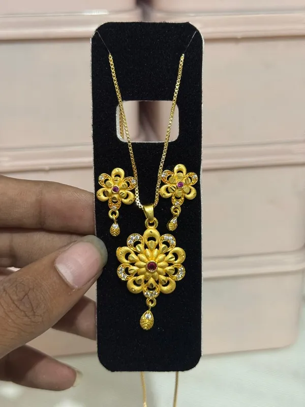 Elegant_Gold_Plated_Floral_Round_Pendant_Set_For_Women_Cz_Ruby_Stone_Studded_Designer_Chain_With_Matching_Drop_Earrings_Wedding_Festive_Wear_Jewellery