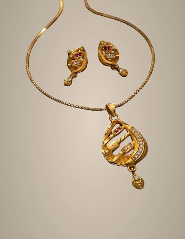 Elegant_Gold_Plated_Stone_Studded_Pendant_Set_For_Women_Designer_Drop_Shape_Pendant_With_Matching_Earrings_Party_Wear_Festive_Jewellery_Combo
