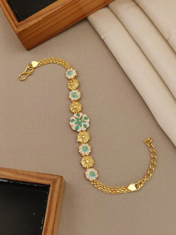 Elegant_Floral_Charm_Bracelet_with_Turquoise_Accents