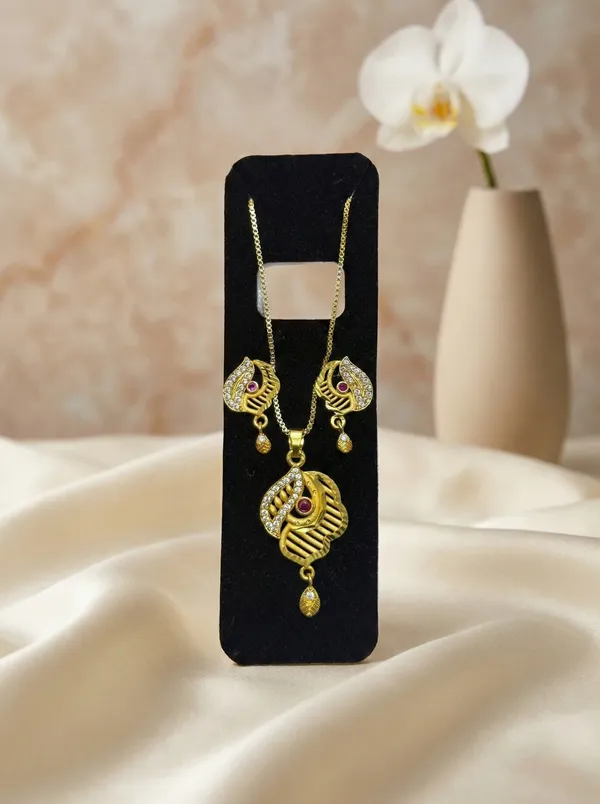 Premium_Gold_Plated_Leaf_Curve_Pendant_Set_For_Women_Cz_Stone_Studded_Fancy_Chain_Necklace_With_Matching_Drop_Earrings_Traditional_Party_Wear_Jewellery