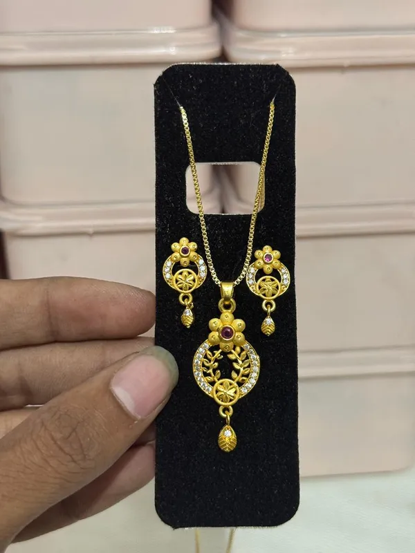 Elegant_Gold_Plated_Floral_Round_Pendant_Set_For_Women_Cz_Ruby_Stone_Studded_Designer_Chain_With_Matching_Drop_Earrings_Wedding_Festive_Wear_Jewellery